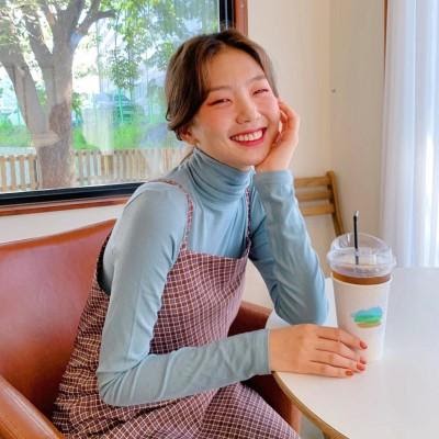 kimehwa layered a turtleneck under a camisole dress