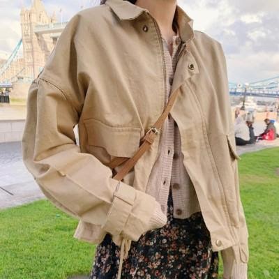 kimehwa worn a jacket over a cardigan